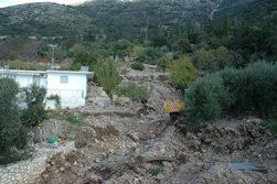 Figure 6b: Catastrophic landslide at Nifi (Thinia valley), November 2007. Photograph by John Underhill.